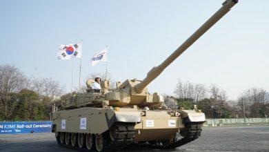 South Korean K2 Black Panther main battle tank kicking up dust during a high-speed field exercise, showcasing the platform's mobility and combat readiness