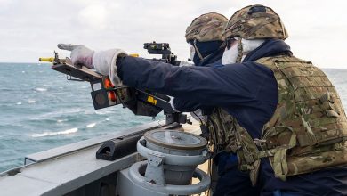 Soldiers onboard HMS Duncan take part in live fire exercises.