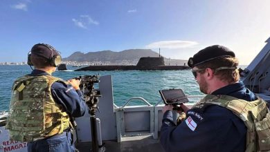 UK Royal Navy troops operating a drone.