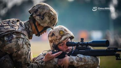 A sniper assigned to a brigade under the Chinese PLA Western Theater Command practice aiming and positioning with a CS/LR4 sniper rifle during a sniper training session.