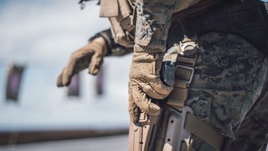 191110-M-HB658-2561 PACIFIC OCEAN (Nov. 10, 2019) U.S. Marine Corps 1st Lt. Luke Boyd, the combined anti-armor team platoon commander with Weapons Company, Battalion Landing Team 3/5, 11th Marine Expeditionary Unit (MEU), draws an M9 pistol during a small arms range aboard the San Antonio-class amphibious transport dock ship USS John P. Murtha (LPD 26). The Marines and Sailors of the 11th MEU are conducting routine operations as part of the Boxer Amphibious Ready Group in the eastern Pacific Ocean. (U.S. Marine Corps photo by Staff Sgt. Donald Holbert)