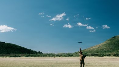 A U.S. Marine Corps mortarman with Kilo Company, Battalion Landing Team 3/6, 22nd Marine Expeditionary Unit (Special Operations Capable), launches a SkyDio X2D small unmanned aircraft system during attack drone training on Camp Santiago, Puerto Rico, Nov. 21, 2025. 22nd MEU(SOC) Marines are being trained and certified by the 2d Marine Division and the Marine Corps Attack Drone Team on first-person view drone systems to enhance combat readiness. U.S. military forces are deployed to the Caribbean in support of the U.S. Southern Command mission, Department of War-directed operations, and the president's priorities to disrupt illicit drug trafficking and protect the homeland. (U.S. Marine Corps photo)