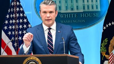 US Secretary of War Pete Hegseth speaks during a news conference in the White House.