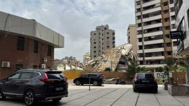 A collapsed building is seen in the Haret Hreik neighborhood of Dahieh in Beirut's southern suburbs on April 19, 2026.