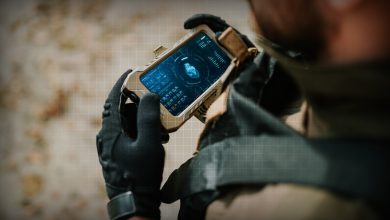 Soldier holding a device with medical data