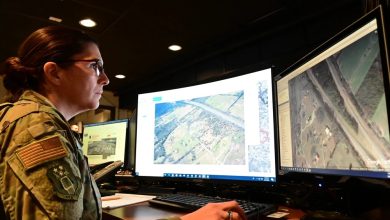 Tennessee Air National Guard personnel analyzes imagery from commercial satellites and open source websites