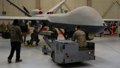Air Commandos assigned to the 27th Special Operations Wing prepare to load a GBU-39B Small Diameter Bomb Weapon System onto an MQ-9 Reaper during a weapons load competition at Cannon Air Force Base, New Mexico, March 27, 2026. The GBU-39B is designed to limit collateral damage, expanding the MQ-9’s ability to deliver persistent, scalable effects in support of special operations forces across a range of operational environments. (U.S. Air Force photo by Staff Sgt. Kevin Williams)