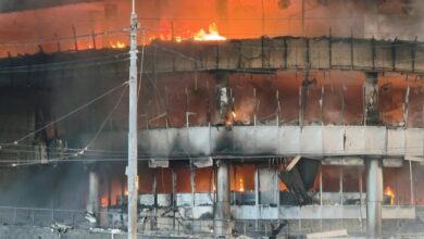 Russia pounds Kyiv with a massive missile and drone attack that kills four people, authorities say, after President Vladimir Putin threatened retaliation for strikes in Russian-occupied eastern Ukraine.