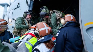 HMS Prince of Wales Maritime Medical Emergency Response Team (MMERT) performs medical response to a simulated injury aboard the HMS Duncan destroyer.