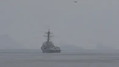 A U.S. Navy guided-missile destroyer sails in the Strait of Hormuz during mine clearance operations.