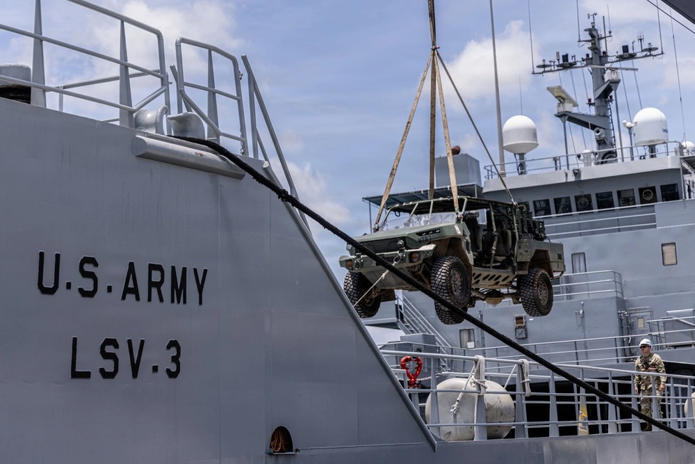 US Army personnel load an Infantry Squad Vehicle onto a Logistics Support Vessel during Salaknib 2026 in the Philippines. Photo: Sgt. Abreanna Goodrich/DVIDS