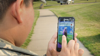 Airman 1st Class Orlando Saenz, services specialist, 184th Force Support Squadron, finds a Pokéstop in the airpark at McConnell Air Force Base July 27. The purpose of Pokémon Go is to get gamers off the couch and out in the community through an interactive game.