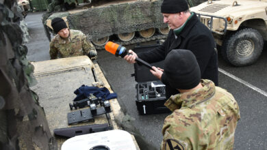 A contractor and a U.S. Soldier with 1st Battalion, 8th Cavalry Regiment, 2nd Armored Brigade Combat Team, 1st Cavalry Division set up a modernized vehicle tactical engagement simulation system (VTESS) on a M1A1 Abrams Main Battle Tank at the 7th Army Training Command’s Grafenwoehr Training Area, Germany, Jan. 9, 2020. The VTESS code modernization increases interoperability to conduct force-on-force training, addressing current training needs while supporting emerging army training requirements and systems. (U.S. Army photo by Gertrud Zach)