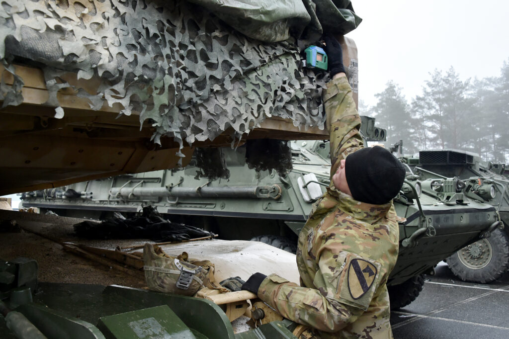 A U.S. Soldier with 1st Battalion, 8th Cavalry Regiment, 2nd Armored Brigade Combat Team, 1st Cavalry Division installs a modernized vehicle tactical engagement simulation system (VTESS) laser detector on a M1A1 Abrams Main Battle Tank at the 7th Army Training Command’s Grafenwoehr Training Area, Germany, Jan. 9, 2020. The VTESS code modernization increases interoperability to conduct force-on-force training, addressing current training needs while supporting emerging army training requirements and systems. (U.S. Army photo by Gertrud Zach)