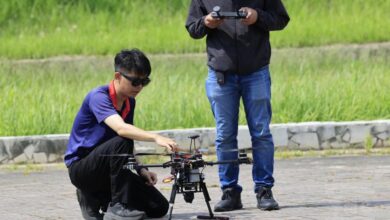 Experts operate a drone equipped with AIxVNAV system. Photo: Taiwan Military News Agency
