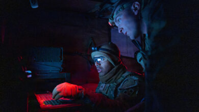 Soldiers assigned to 2nd Battalion, 77th Field Artillery Regiment, 4th Infantry Division Artillery, 4th Infantry Division, analyze data on a computer during a deployment readiness exercise, April 29, 2026, at Fort Carson, Colorado. Digital systems enable faster decision-making and improve coordination across fire support elements. (U.S. Army photo by Spc. Jonathan Reyes)