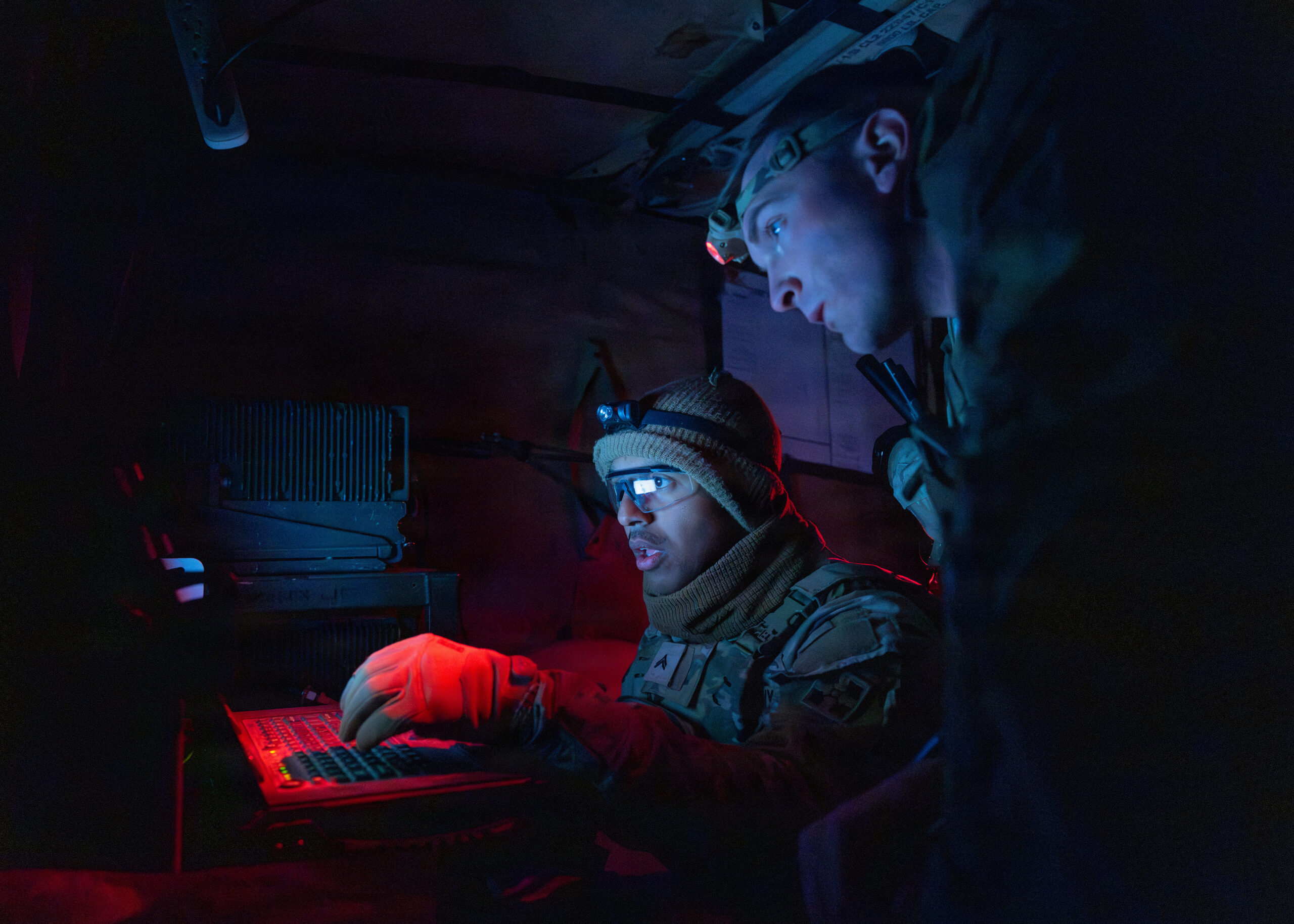Soldiers assigned to 2nd Battalion, 77th Field Artillery Regiment, 4th Infantry Division Artillery, 4th Infantry Division, analyze data on a computer during a deployment readiness exercise, April 29, 2026, at Fort Carson, Colorado. Digital systems enable faster decision-making and improve coordination across fire support elements. (U.S. Army photo by Spc. Jonathan Reyes)