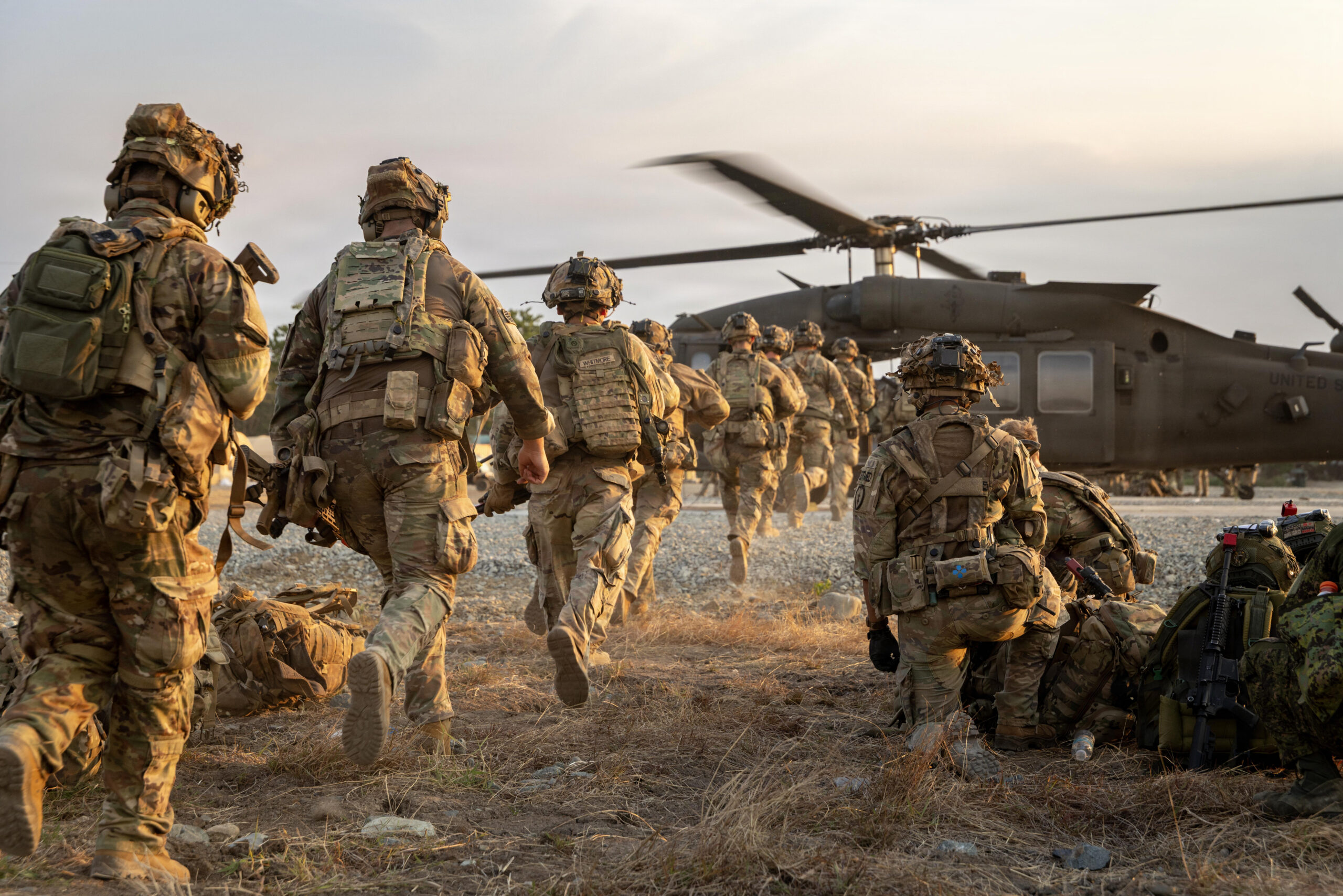 U.S. Soldiers assigned to 2nd Battalion, 35th Infantry Regiment, 3rd Mobile Brigade, 25th Infantry Division board a UH-60 Black Hawk