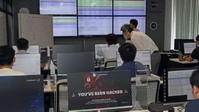 Company employees and college students take part in a workshop to prevent cyber attacks in Fukuoka Prefecture on July 20, 2022.