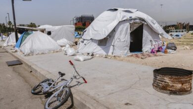 White humanitarian tents are set up along the sidewalk on the Beirut waterfront near Bain St Georges (Zaituna Bay) in Beirut, Lebanon, on May 12, 2026.