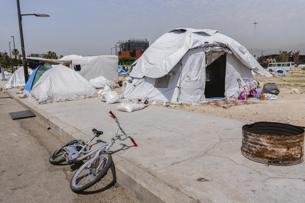 White humanitarian tents are set up along the sidewalk on the Beirut waterfront near Bain St Georges (Zaituna Bay) in Beirut, Lebanon, on May 12, 2026.