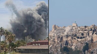 Smoke billows over Tyre and Kfar Tebnit after Israeli strikes, as an Israeli flag flutters atop the 12th-century Crusader-era Beaufort Castle in southern Lebanon.