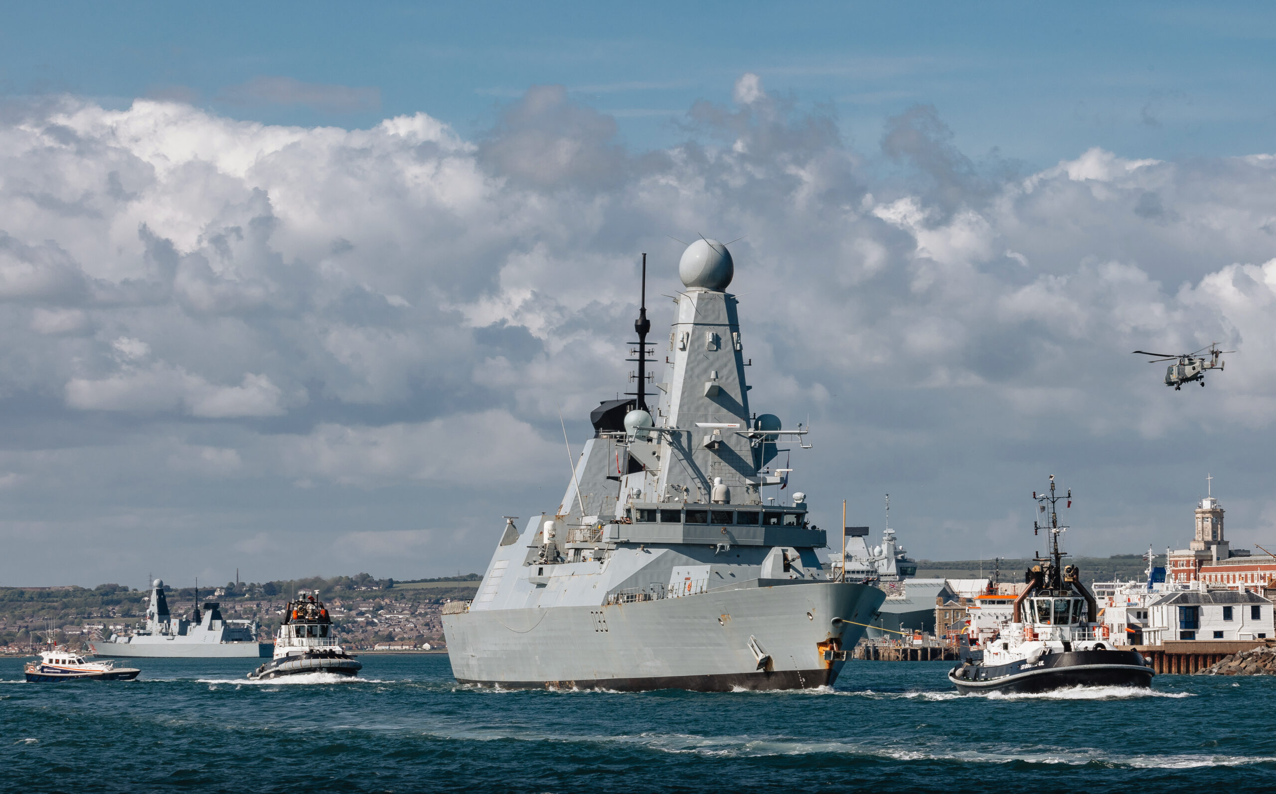 Pictured: HMS Dauntless as she departs Portsmouth supporting Op HIGHMAST. The UK’s premier naval deployment of 2025 sailed today, led by the nation’s flagship, the aircraft carrier HMS Prince of Wales. HMS Prince of Wales left Portsmouth as she prepares to lead an international task force to the Indo-Pacific on an eight-month mission to demonstrate UK and allied collective resolve and determination to maintain security and freedom from the Atlantic to the Pacific. Between now and December, the Carrier Strike Group will conduct a series of exercises and operations with air, sea and land forces of a dozen allies in the Mediterranean, Middle East, South-east Asia, Japan and Australia. OP HIGHMAST is a multinational deployment to the Indo-Pacific, led by the Royal Navy Flagship HMS Prince of Wales, reaffirming the UK’s commitment to the security of the Mediterranean and Indo-Pacific, while providing an opportunity to promote British trade and industry.