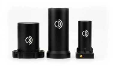 Three Notch MAGIC Series antennas in varying sizes with matte black cylindrical housings and mounting bases