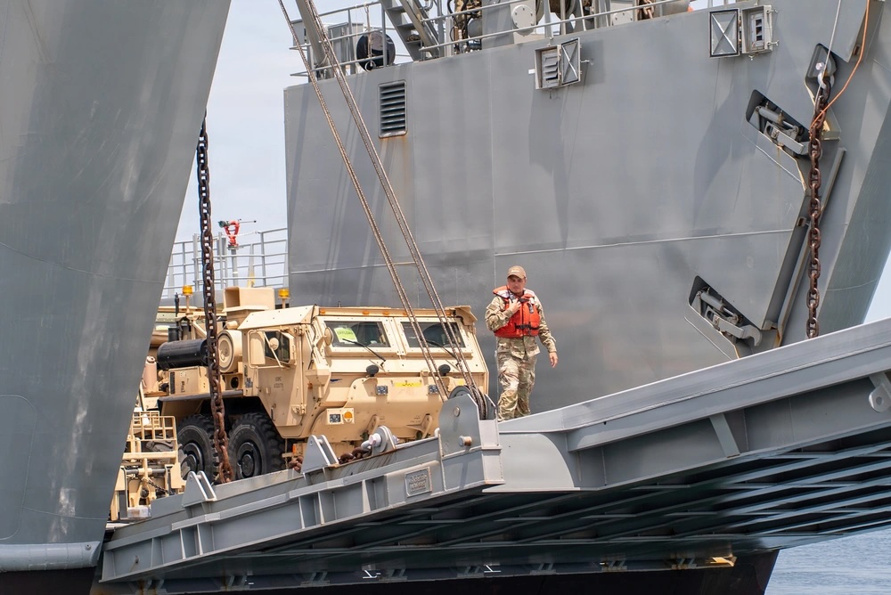 US Army vehicles offload from a logistics support vessel during CJLOTS 2026 in South Korea. Photo: Sgt. Alexcia Rupert/DVIDS