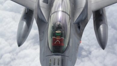 A Turkish Air Force F-16 recieves a mid air refuel from a NATO allied aircraft