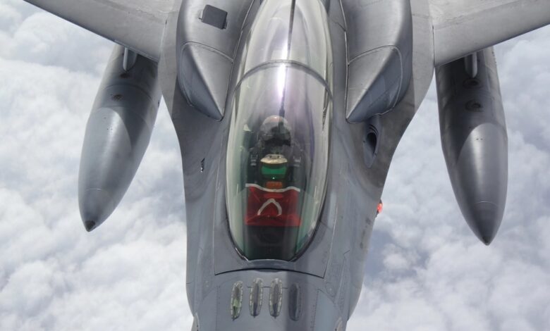 A Turkish Air Force F-16 recieves a mid air refuel from a NATO allied aircraft