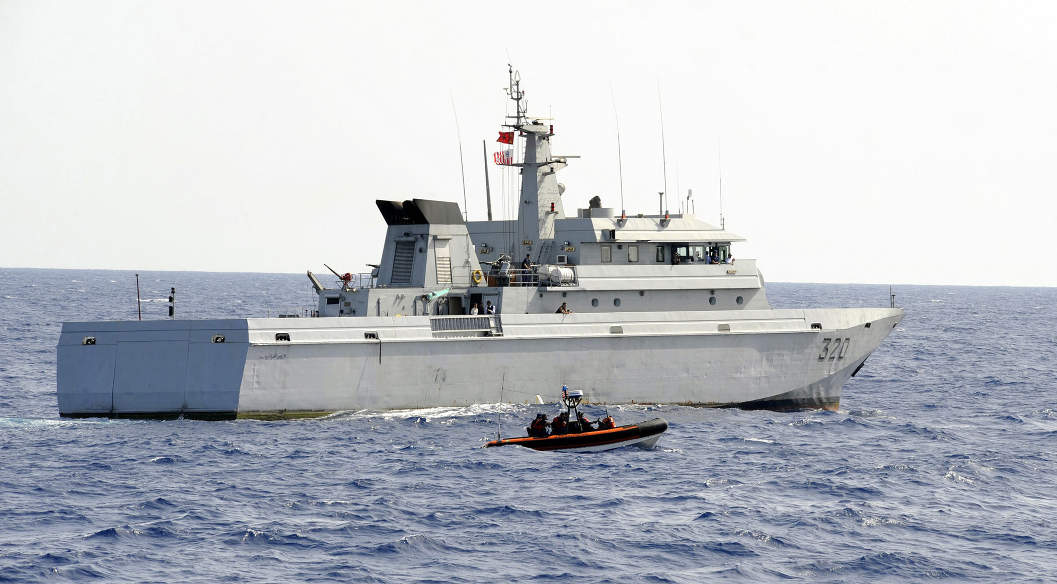 The Moroccan Royal Navy Vessel Rais Charkaoui, alongside a U.S. Coast Guard Over-the-Horizon small boat from the Coast Guard Cutter Legare, conduct the first-ever joint Moroccan/U.S boarding, July 23. The U.S. Coast Guard and the Moroccan Royal Navy partnered for a nine-day joint law enforcement operation in Moroccan territorial waters, which showcased each services tactics, techniques and boarding procedures. The U.S. Coast Guard, under the direction of Commander, U.S. Naval Forces Europe- Commander, U.S. Naval Forces Africa, conducted law enforcement operations with the Moroccan Royal Navy in a partnership to build a safer, more prosperous sea-trade environment in the region.