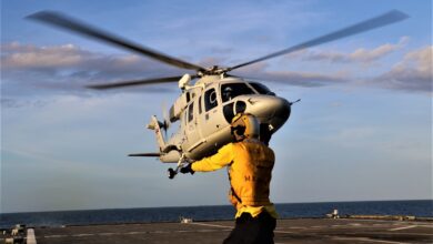 220525-N-EU544-8243 GULF OF THAILAND (May 25, 2022) Boatswain’s Mate 2nd Class David Miller, from Chicago, directs a Royal Thai Navy Sikorsky S-76B helicopter during cross-deck landing qualifications on the flight deck aboard the Independence-variant littoral combat ship USS Jackson (LCS 6) during Cooperation Afloat Readiness and Training (CARAT) Thailand 2022. CARAT Thailand is an annual bilateral naval exercise between the U.S. Navy and Royal Thai Navy. Thailand has been part of the CARAT exercise series since 1995. Now in its 28th year, the CARAT series comprises multiple multinational exercises, designed to enhance U.S. and allied and partner navies’ abilities to operate together in response to traditional and non-traditional maritime security challenges in the Indo-Pacific. (U.S. Navy photo by Gunner’s Mate 2nd Class Joel Maldonado)