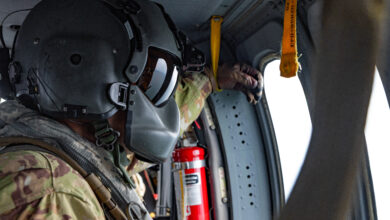Connecticut Army National Guard Sgt. 1st Class Richard Wooten, a crew chief assigned to 1109th Theater Aviation Support Maintenance Group, looks out the window of a UH-60 Blackhawk helicopter, during a flight over the United States, Sept. 8, 2025. Wooten wears the HGU-56/P Aircrew Integrated Helmet System, which offers improved comfort, impact protection, retention and sound attenuation over the SPH-4 flight helmet which it replaced. (U.S. Army photo by Sgt. Matthew Lucibello)