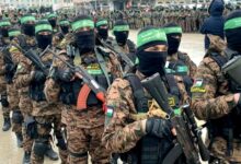 Members of Hamas's armed wing, the Ezzedine al-Qassam Brigades, take part in a formation in Khan Yunis, Gaza. Hamas says its agreement with Israel includes provisions on the group's weapons and a gradual withdrawal of Israeli forces from the Gaza Strip. Image: AFP TV