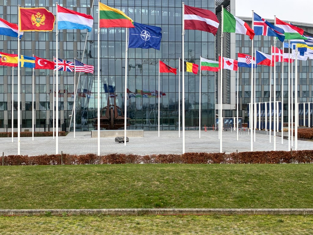 NATO headquarters in Brussels, Belgium, displays the flags of the alliance's 32 member states. Photo: Michael Nguyen/NurPhoto via AFP