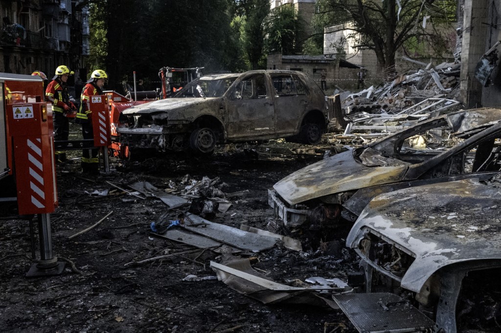 Emergency services conduct rescue operations at the site of a Russian missile strike in Kyiv, Ukraine, on July 19, 2026.