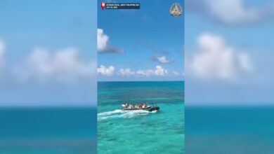 Resized screenshot from a video from the Philippines military shows individuals on a boat, identified by authorities as members of the China Coast Guard, appearing to clash with members of the Philippine Navy on the Second Thomas Shoal in the disputed South China Sea.