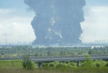 Ukrainian drones hit a warehouse for a Russian e-commerce giant near Saint Petersburg early Friday, triggering a fire that sent smoke pouring over the historic city, according to local officials.
