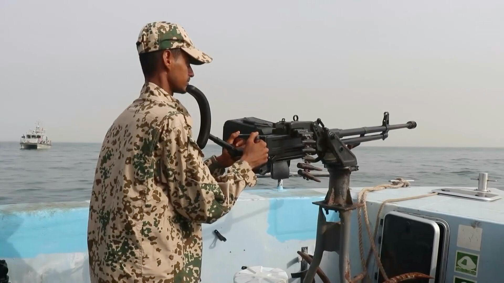 A member of Yemen's National Resistance Forces patrols the international shipping lane near the Bab al-Mandeb Strait in the Red Sea on July 28, 2026. Yemen's internationally recognized government says it is prepared for further escalation with the Houthis following attacks targeting Saudi Arabia. Photo: AFP