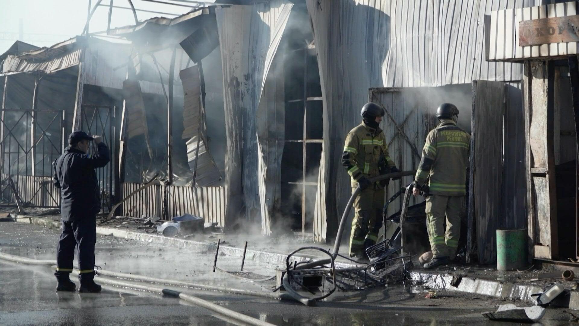 Firefighters extinguish flames and clear debris after a Russian missile strike destroyed a market in Kyiv, Ukraine, on July 30, 2026. The overnight attack was part of a large-scale Russian missile and drone barrage that killed at least eight people across Ukraine. Photo: Sergii Volskyi/AFPTV/AFP