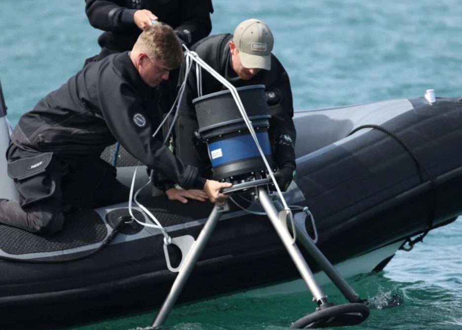 Sentinel IDS sonar head being deployed from a RHIB