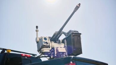 An Electro Optic Systems (EOS) Slinger remote weapon station mounted on a pickup truck, acting as a representative image for Australia's new R400 Slinger counter-drone system contract.