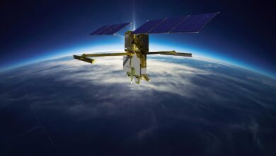 Artist's illustration of the Surface Water and Ocean Topography (SWOT) satellite in Earth orbit. Earth observation satellites support scientific research, disaster response, and critical infrastructure monitoring. Image: NASA