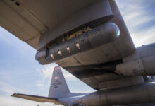 A 189th Airlift Wing C-130H is mounted with a Northrop Grumman LITENING pod targeting system as part of an Air National Guard Air Force Reserve Test Center program to develop a highly-accurate air drop and reconnaissance system. The Arkansas Air National Guard unit has been tapped as a test bed and has sent aircraft, aircrews and maintainers to Arizona for the test program.