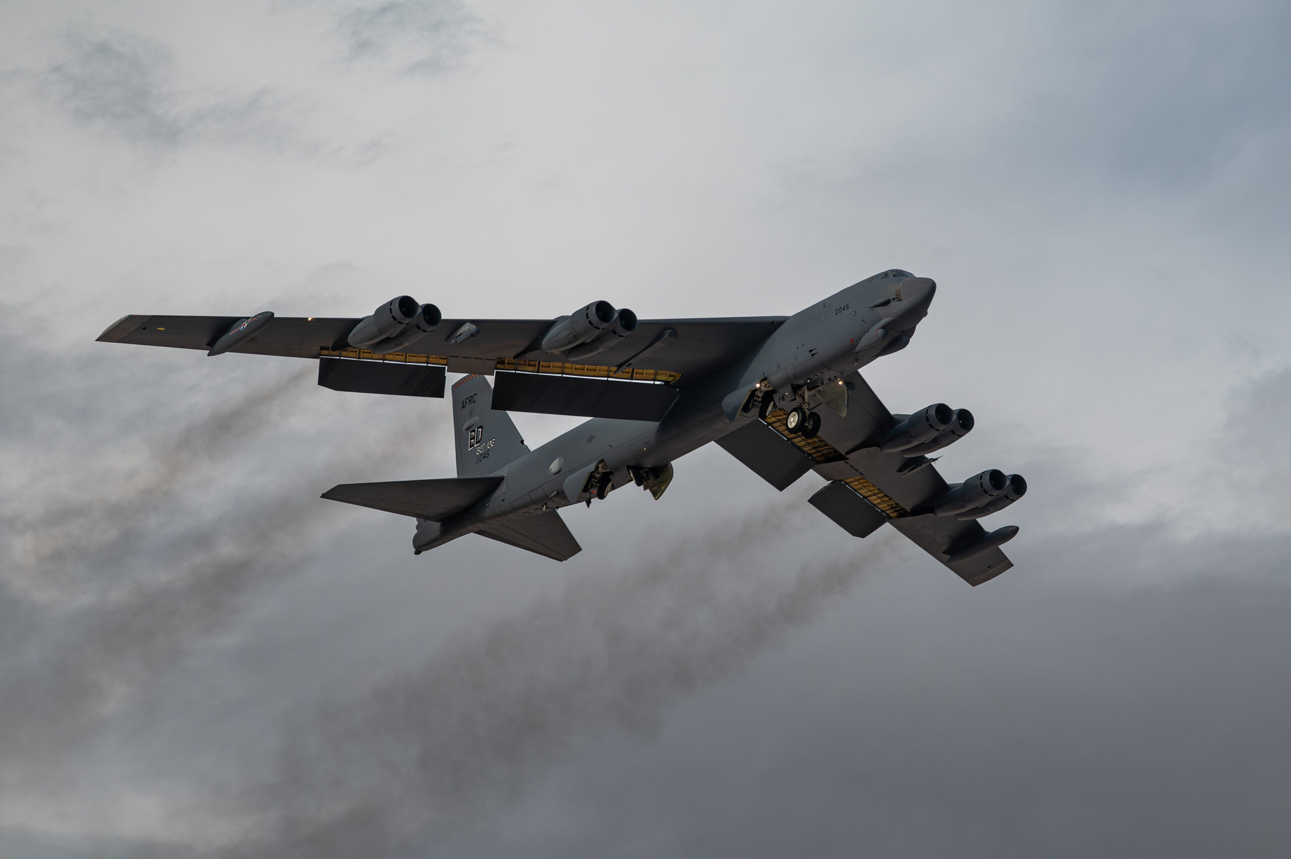 A U.S. Air Force B-52 Stratofortress assigned to the 340th Weapons Squadron, Barksdale Air Force Base (AFB), Louisiana, takes off during a U.S. Air Force Weapons School Integration (WSINT) exercise at Nellis AFB, Nev., Nov. 18, 2025. Conducted twice a year, the integration event tests multi-domain operations and strengthens joint force interoperability, enhancing combat readiness across the spectrum of military operations over the Nevada Test and Training Range. (U.S. Air Force photo by William R. Lewis)